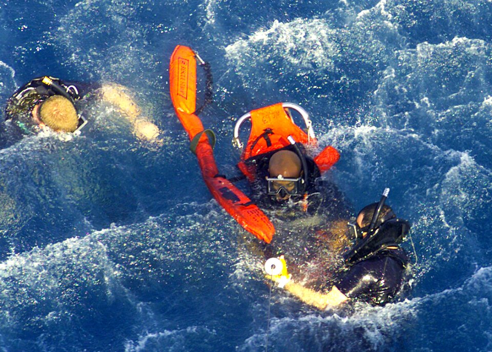 US Navy 030425-N-2819P-030 personnel assigned to Helicopter Combat Support Squadron Eight (HC-8) conduct search and rescue training exercises