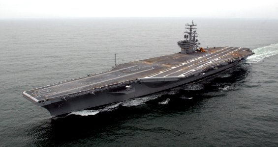 US Navy 030505-N-0610T-001 Sailors aboard the Precommissioning Unit (PCU) Ronald Reagan took the world's newest aircraft carrier out to sea for the first time during Builder's Sea Trials off the coast of Virginia