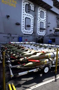 US Navy 030414-N-2385R-003 Ordnance is inspected prior to being loaded onto aircraft