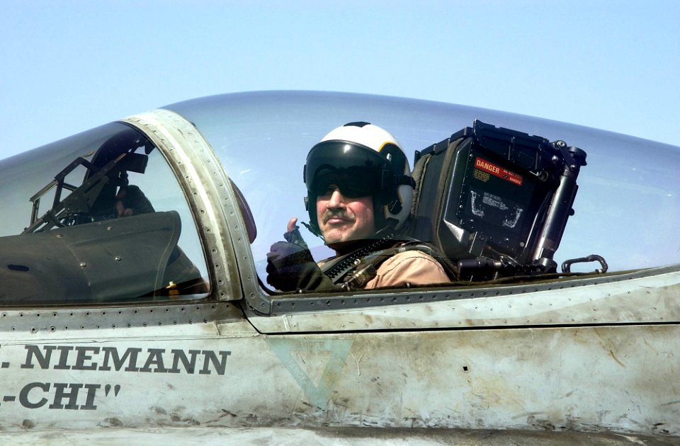 US Navy 030415-N-4142G-011 Captain Mark Fox, Commander, Carrier Air Wing Two (CVW-2), looks out of his jet before launching on his final flight as Commander