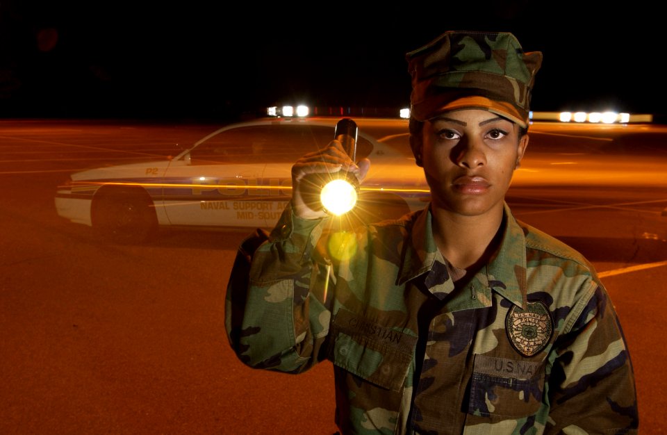 US Navy 030404-N-5862D-012 Master-at-Arms Seaman Treva Christian from San Diego, Calif., is a key member of the Naval Support Activity (NSA) Mid-South Police Force