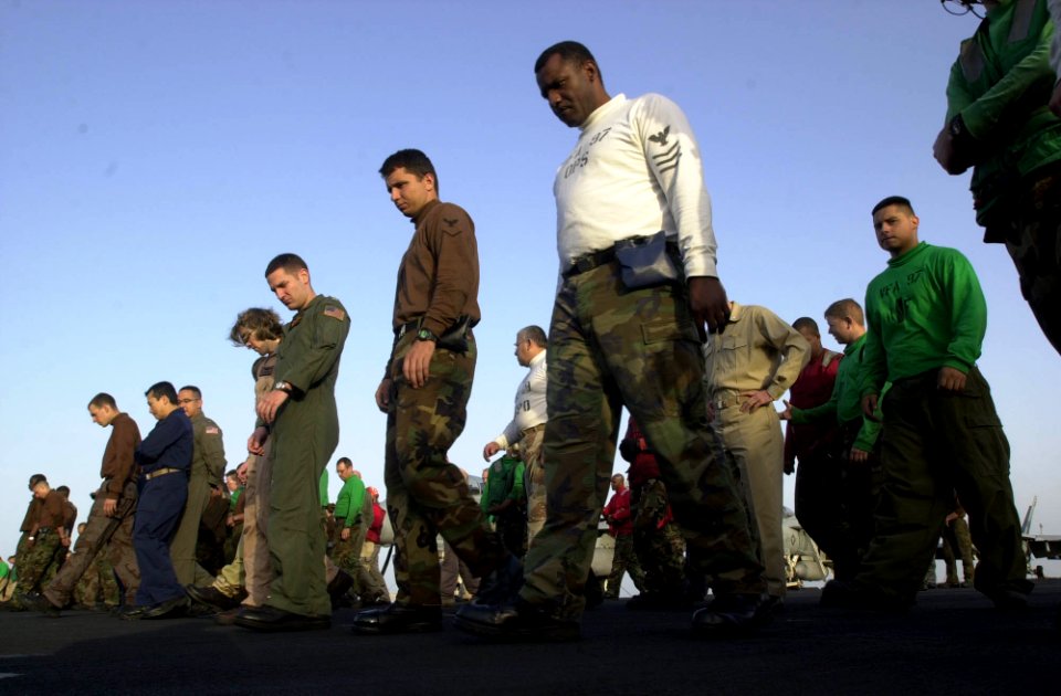 US Navy 030417-N-2385R-007 Sailors participate in the daily Foreign Object Damage (FOD) Walk-down on the flight deck aboard USS Nimitz (CVN 68)