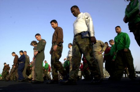 US Navy 030417-N-2385R-007 Sailors participate in the daily Foreign Object Damage (FOD) Walk-down on the flight deck aboard USS Nimitz (CVN 68)
