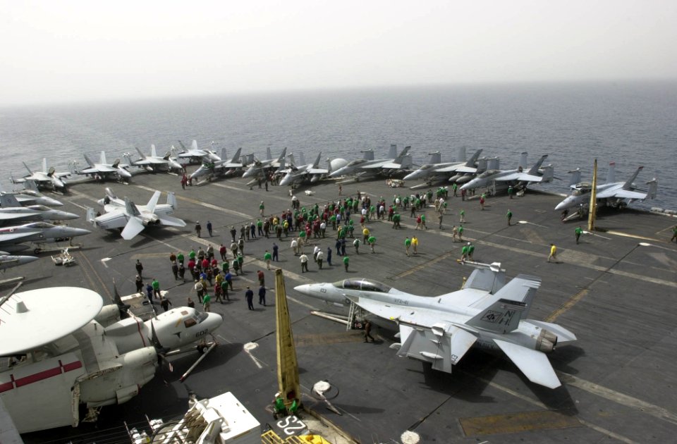 US Navy 030417-N-0413R-009 Sailors participate in the daily Foreign Object Damage (FOD) Walk-down on the flight deck aboard USS Nimitz (CVN 68)