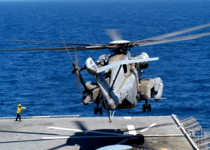 US Navy 030430-N-2819P-036 A CH-53E Super Stallion helicopter launches from the flight deck aboard USS Kearsarge (LHD 3). Kearsarge is deployed conducting missions in support of Operation Iraqi Freedom photo