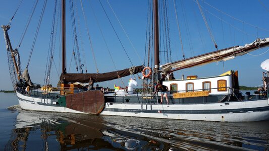 Sailing boat vessel blue sky photo