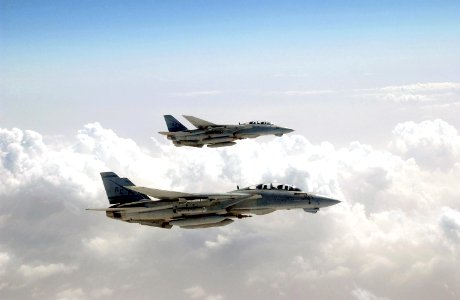 US Navy 030409-F-1631A-002 F-14's from the USS Harry S Truman (CVN 75) fly in observation formation off the wing of a KC-10 Extender