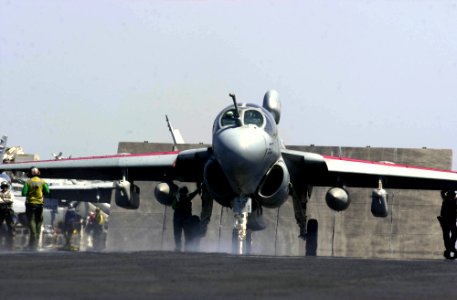 US Navy 030418-N-2385R-009 An EA-6B Prowler assigned to the Black Ravens of Electronic Attack Squadron One Three Five (VAQ-135) is checked and prepared for launch