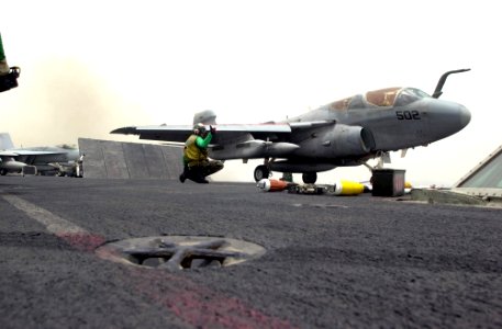 US Navy 030517-N-2385R-005 An EA-6B Prowler assigned to the Black Ravens of Electronic Attack Squadron One Three Five (VAQ-135) prepares to take off from one of four steam-powered catapults during flight operations on the fligh