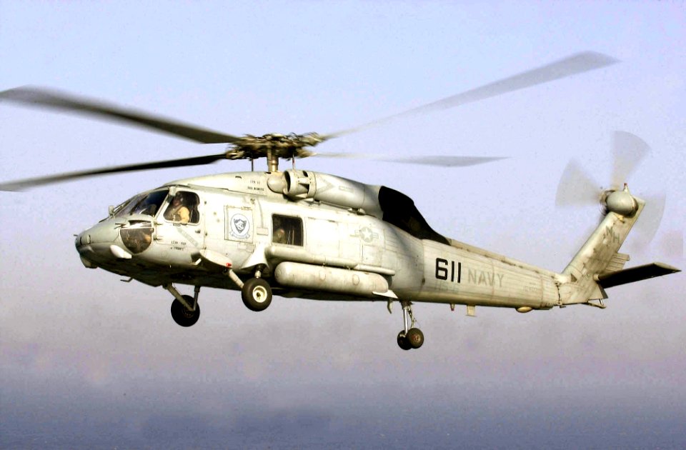 US Navy 030424-N-6536T-001 An SH-60 Seahawk assigned to the Screaming Indians of Helicopter Antisubmarine Squadron Six (HS-6
