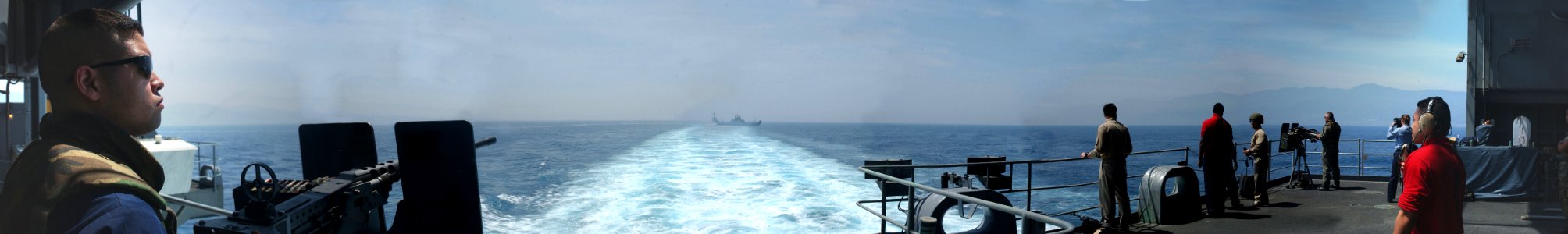 US Navy 030501-N-1290G-002 Sailors stand watch while transiting through the Straits of Messina