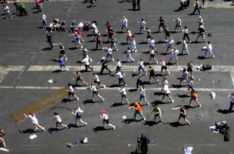 US Navy 030501-N-2143T-003 Sailors assigned to USS Nimitz (CVN 68) and Carrier Air Wing Eleven (CVW-11) participate in cardio-kickboxing during a steel beach picnic