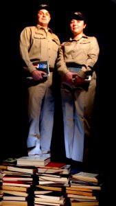 US Navy 030423-N-0696M-001 Lt. Paul Clifford and Lt. Jacqueline Pousset, assigned to Reactor Department of Pre-commissioning Unit Ronald Reagan (CVN 76), recently completed their Master's Degree from Old Dominion University