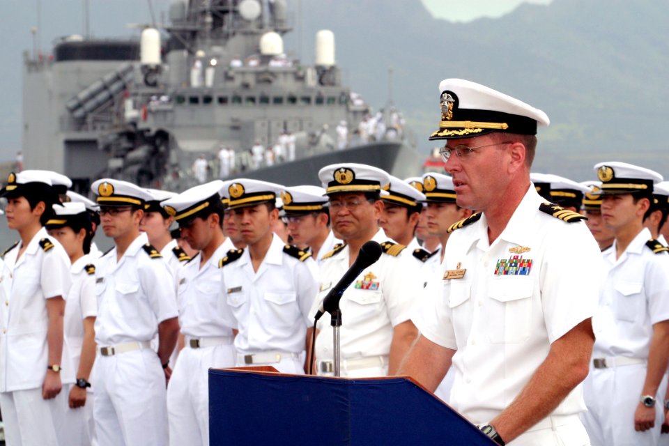 US Navy 030507-N-3228G-001 Commanding Officer of the guided missile destroyer USS Russell (DDG 59) Cmdr. William Kearns III, speaks to spectators during a welcoming ceremony for Japanese Maritime Self-Defense Force