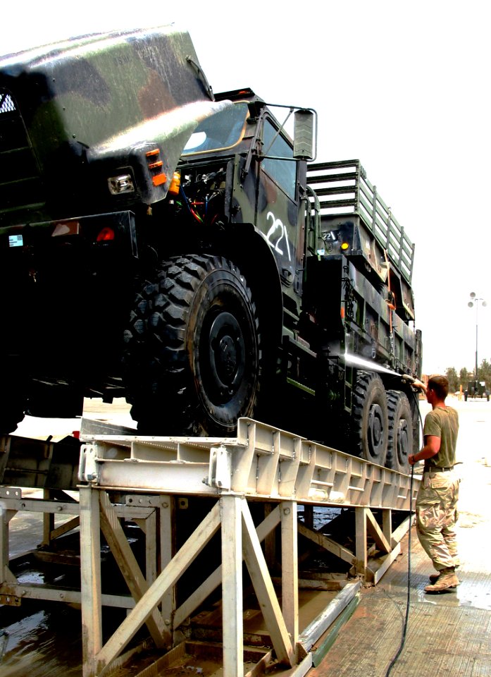 US Navy 030514-N-1050K-010 U.S. Marines assigned to Task Force Tarawa wash down their vehicles and equipment in preparation for their return to Camp Lejeune