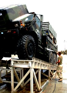 US Navy 030514-N-1050K-010 U.S. Marines assigned to Task Force Tarawa wash down their vehicles and equipment in preparation for their return to Camp Lejeune