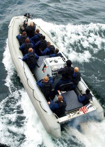 US Navy 030612-N-4374S-003 The Vessel Boarding Search and Seizure (VBSS) team from the Aegis class, guided missile cruiser USS Vella Gulf (CG 72) departs on a training exercise with the German Bremen class frigate FGS Lubeck (F