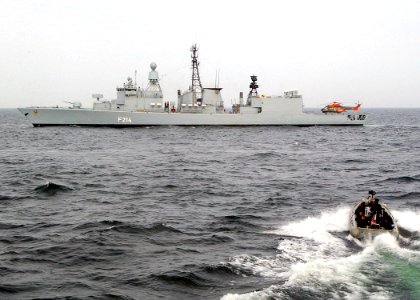 US Navy 030612-N-4374S-024 The Vessel Boarding Search and Seizure (VBSS) team from the Aegis cruiser USS Vella Gulf (CG 72), approaches on a German Bremen class frigate FGS Lubeck (F 214) to conduct a VBSS training exercise