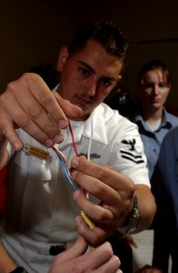 US Navy 030415-N-5862D-048 Mineman 2nd Class Mario Adame from Tucson, Ariz., is an instructor aboard the Mine Warfare Training Center