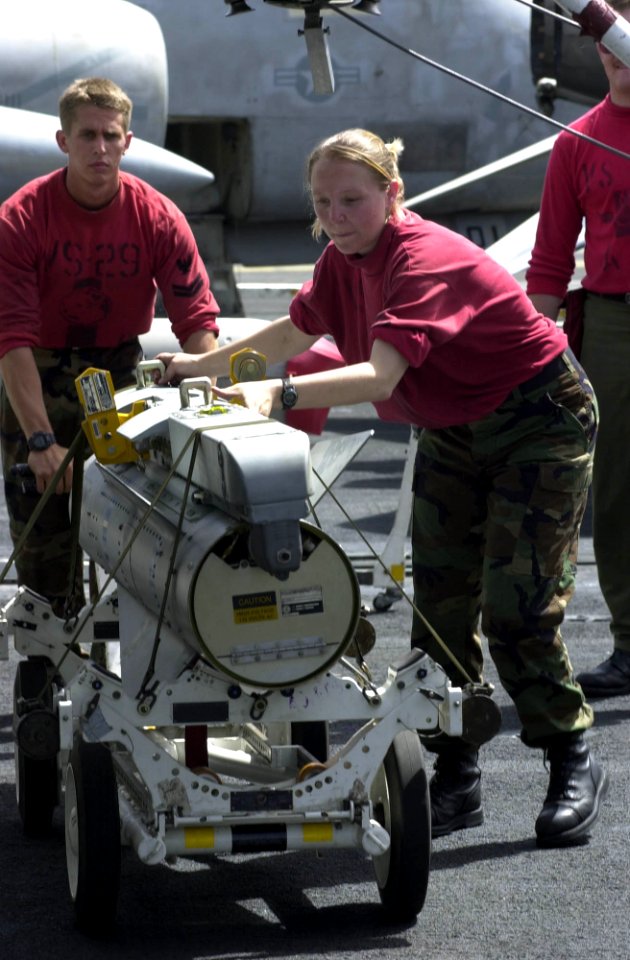 US Navy 030520-N-2143T-003 Aviation Ordnancemen load a Stand Off Land Attack Missile Expanded Response (SLAM-ER) on an S-3B Viking aircraft aboard USS Nimitz (CVN 68)