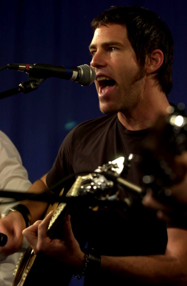 US Navy 030529-N-8273J-003 J.R. Richards, lead singer for the band Dishwalla, performs on Shipboard Information Training and Entertainment Television (SITE TV) for the crewmembers aboard USS Nimitz (CVN 68)