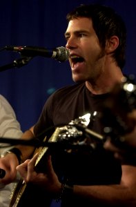 US Navy 030529-N-8273J-003 J.R. Richards, lead singer for the band Dishwalla, performs on Shipboard Information Training and Entertainment Television (SITE TV) for the crewmembers aboard USS Nimitz (CVN 68)