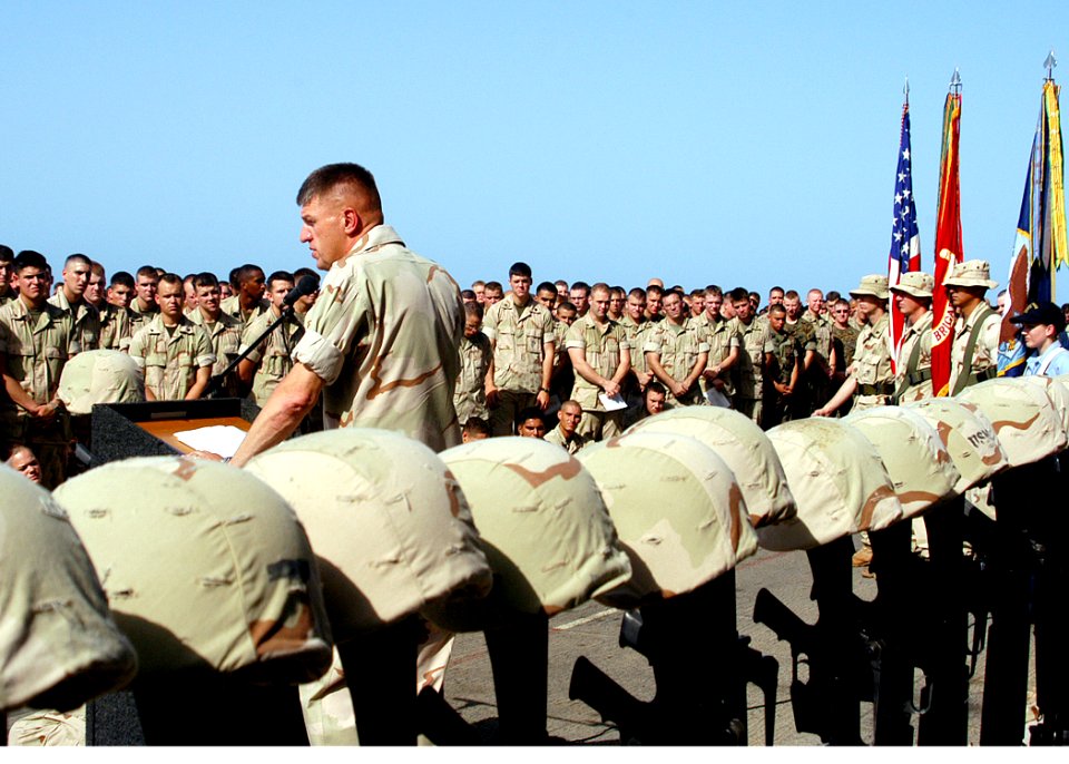 US Navy 030526-N-4048T-063 Brig. Gen. Richard F. Natonski, Commanding General 2D Marine Expeditionary Brigade addresses more than 1,000 Sailors and Marines during a Memorial Day Service conducted on the ship's flight deck