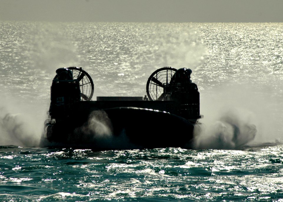 US Navy 090106-N-9134V-003 A landing craft air cushion approaches the amphibious dock landing ship USS Carter Hall (LSD 50)