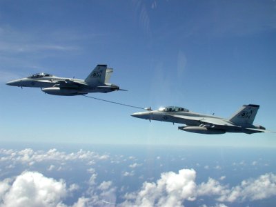 US Navy 030519-N-0000X-001 F-A-18F Super Hornets assigned to the Black Aces conduct in-flight refueling exercises over Iraq
