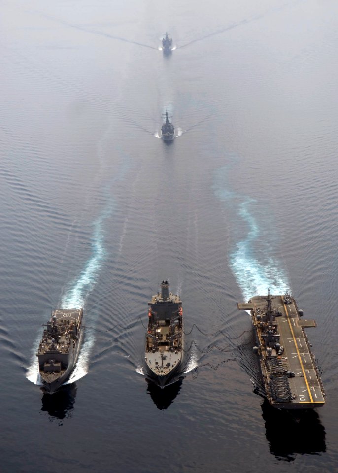 US Navy 090206-N-5253W-170 USS Tortuga (LSD 46) and USS Essex (LHD 2) receive fuel from USNS Rappahannock (T-AO 204)