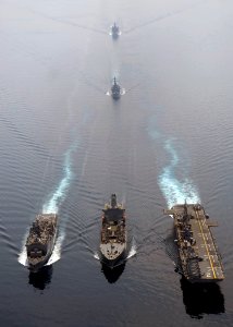 US Navy 090206-N-5253W-170 USS Tortuga (LSD 46) and USS Essex (LHD 2) receive fuel from USNS Rappahannock (T-AO 204)