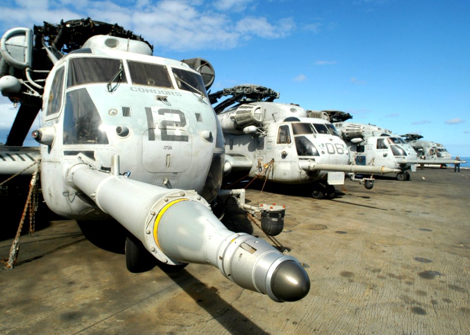 US Navy 030623-N-1512S-516 CH-53E Super Stallions line the deck aboard the amphibious assault ship USS Kearsarge (LHD 3) photo