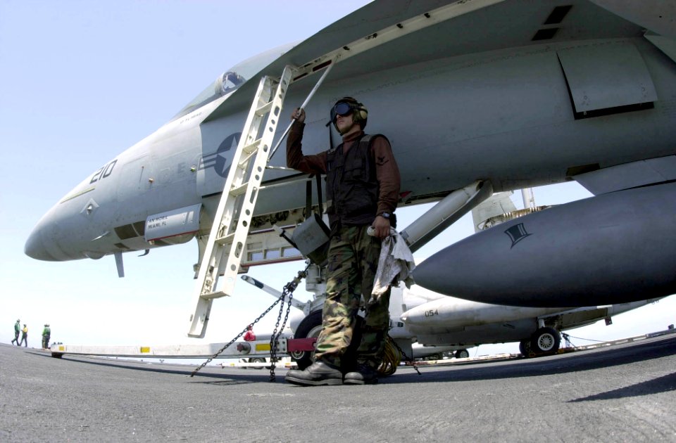 US Navy 030526-N-2385R-005 Aviation Electrician's Mate 3rd Class Christopher Pelissier, of Murphysboro, Ill., assigned to the Top Hatters of Strike Fighter Squadron Fourteen