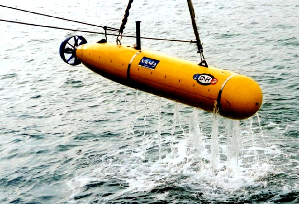 US Navy 030610-N-0000X-001 The crew aboard the mine hunter coastal ship USS Falcon (MHC 59) recover the Battlespace Preparation Autonomous Underwater Vehicle (BPAUV) after a demonstration
