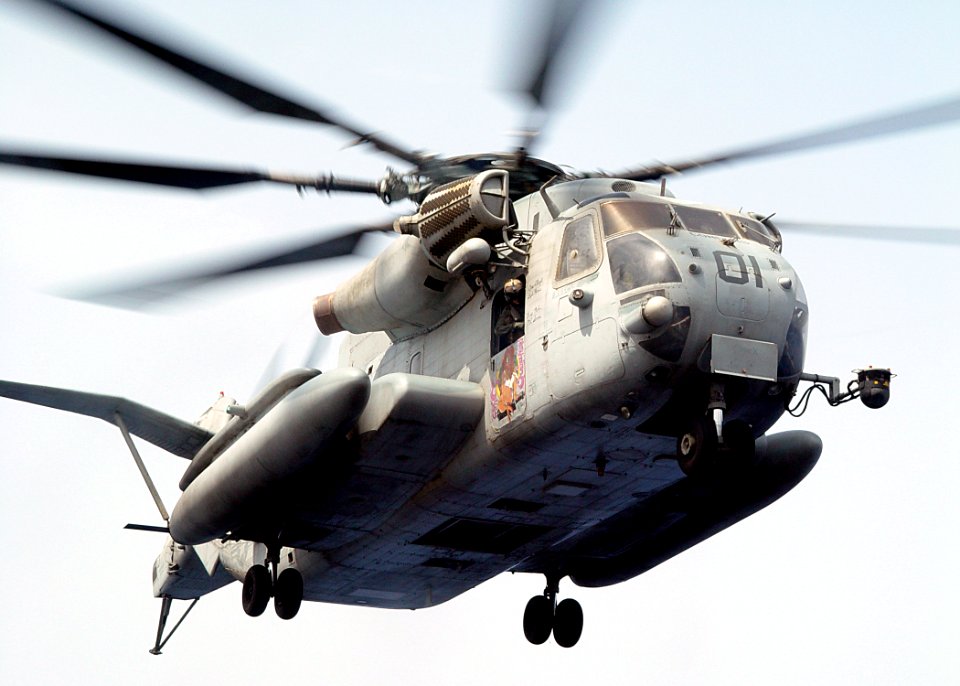 US Navy 030612-N-2972R-073 A CH-53E Super Stallion prepares to land on the flight deck to transfer elements from the Second Marine Expeditionary Brigade (2nd MEB) to the amphibious assault ship USS Bataan (LHD 5)
