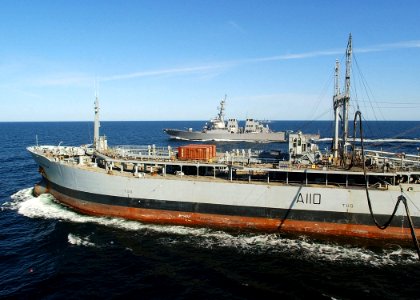 US Navy 030617-N-4374S-009 The Arleigh Burke-class, guided missile destroyer USS Ross (DDG 71), steams through the Baltic Sea while the British oiler RFA Orange Leaf (A 110) conducts underway replenishment with the Aegis class