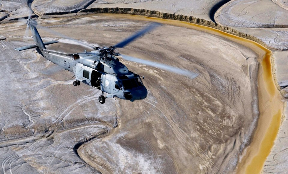US Navy 030805-F-4884R-005 An SH-60F Seahawk from Helicopter Anti-Submarine Squadron Two (HS-2), returns to base after a mission during exercise Desert Rescue XI, at Naval Air Station Fallon