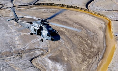 US Navy 030805-F-4884R-005 An SH-60F Seahawk from Helicopter Anti-Submarine Squadron Two (HS-2), returns to base after a mission during exercise Desert Rescue XI, at Naval Air Station Fallon