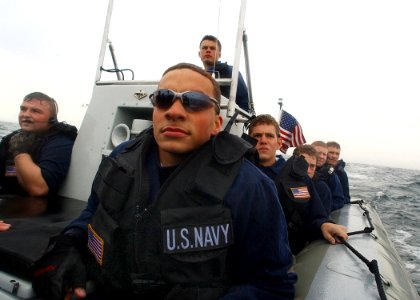 US Navy 030609-N-4374S-021 Members of the Vessel Boarding Search and Seizure (VBSS) team from the aegis cruiser USS Vella Gulf (CG 72) photo