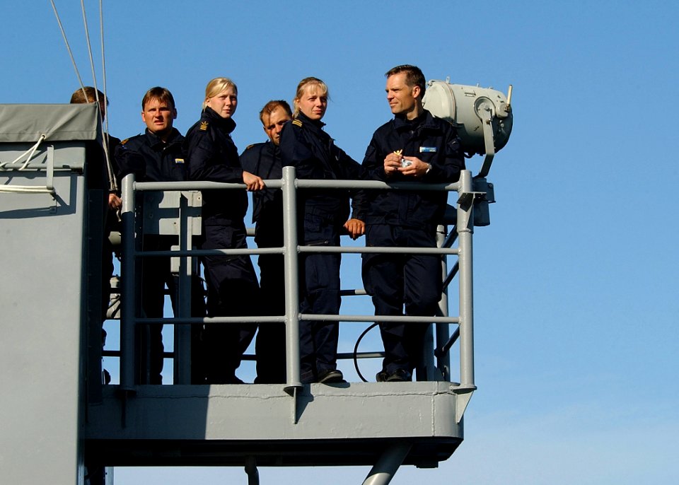US Navy 030617-N-4374S-008 Crewmembers assigned to the Swedish fast patrol boat HSwMS Norrkoping (R 131), observe the underway replenishment evolution while visiting aboard the Aegis class, guided missile cruiser USS Vella Gulf