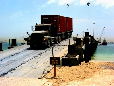 US Navy 030514-N-1050K-023 A U.S. Army transport vehicle returns from the U.S. Navy Elevated Causeway System-Modular