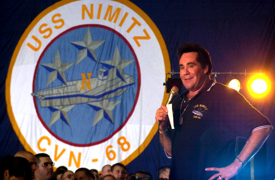 US Navy 030619-N-9319H-005 Actor-Entertainer Wayne Newton performs on stage during a United Services Organization (USO) show aboard USS Nimitz (CVN 68)