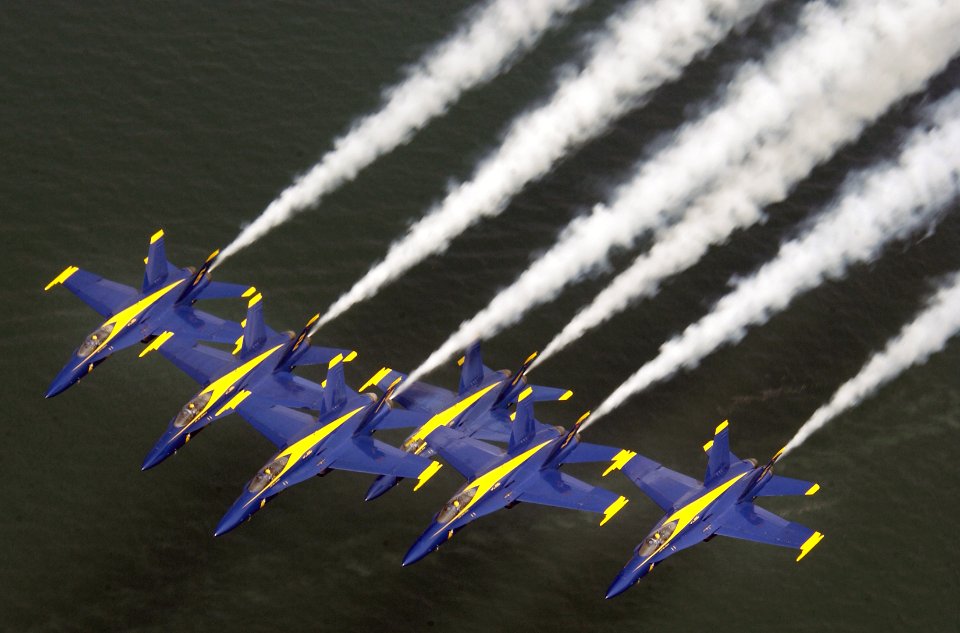 US Navy 030627-N-3935B-001 The Blue Angels fly a Delta formation low over the waters near Nantucket Island, Mass