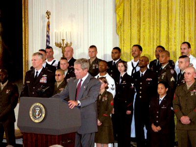 US Navy 030701-A-0000S-003 President Bush addresses an assembled audience during a White House ceremony commemorating the 30th anniversary of the all-volunteer force