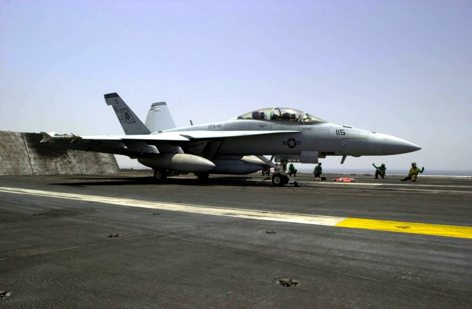 US Navy 030518-N-2385R-002 An F-A-18F Super Hornet prepares to launch from one of four steam-powered catapults on the flight deck aboard USS Nimitz (CVN 68)
