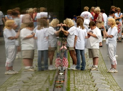 US Navy 030616-N-9593R-153 Visitors to the Vietnam Veterans Memorial Wall, take rubbings of names