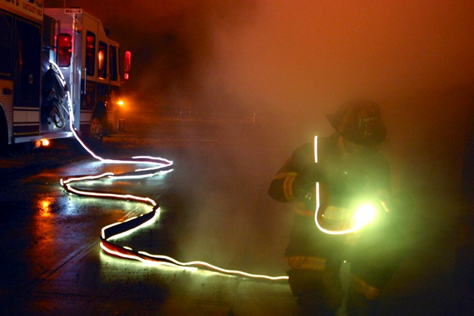 US Navy 030710-N-9999X-001 The moonlight fire hose is an illuminating fire hose being developed at Naval Air Systems Command (NAVAIR) Lakehurst
