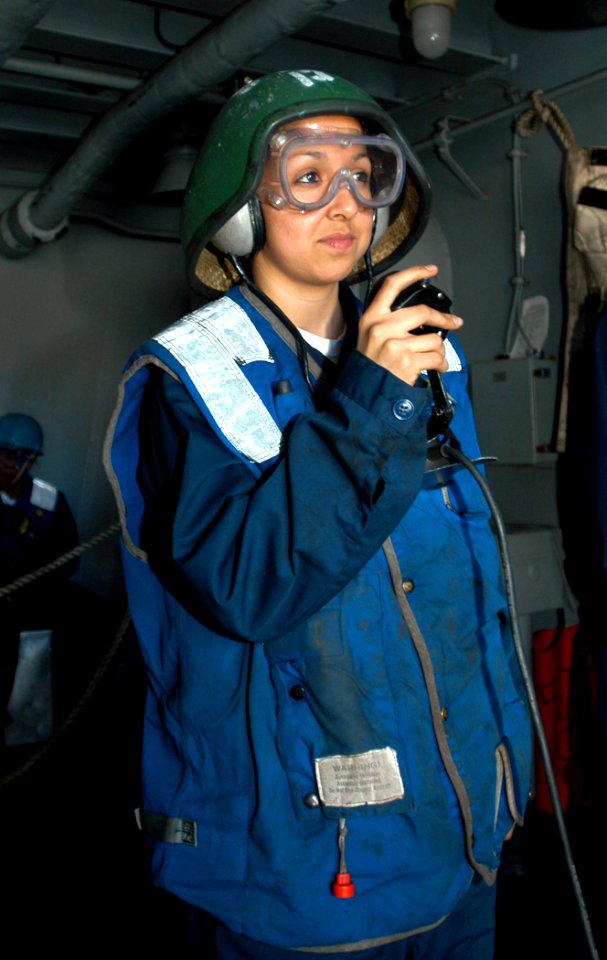US Navy 030522-N-5786V-506 aman Abby Ramos from Robertsdale, Ala., uses a sound-powered telephone during an underway replenishment between the fast combat support ship USNS Arctic (T-AOE 8) and the Theodore Roosevelt