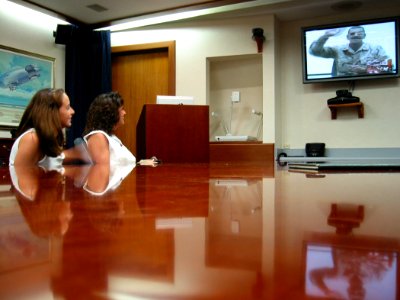 US Navy 030621-N-7780X-003 Forward deployed soldiers assigned to the U.S. Army 887th Quartermaster Company contacted their loved ones via Video Tele Conferencing (VTC) provided by Navy Region South through special arrangement w