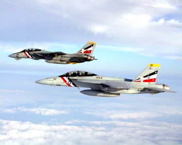 US Navy 030531-N-0000X-002 An F-14D Tomcat, far aircraft, assigned to the Bounty Hunters of Fighter Squadron Two (VF-2)